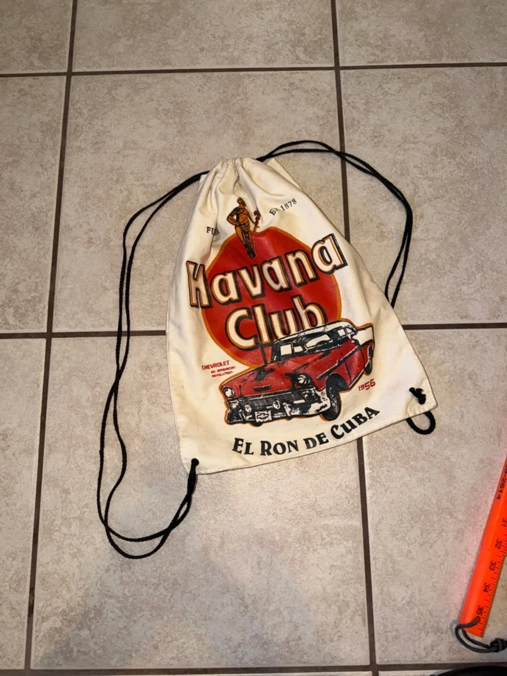 Cream Drawstring Backpack with Red Graphic
